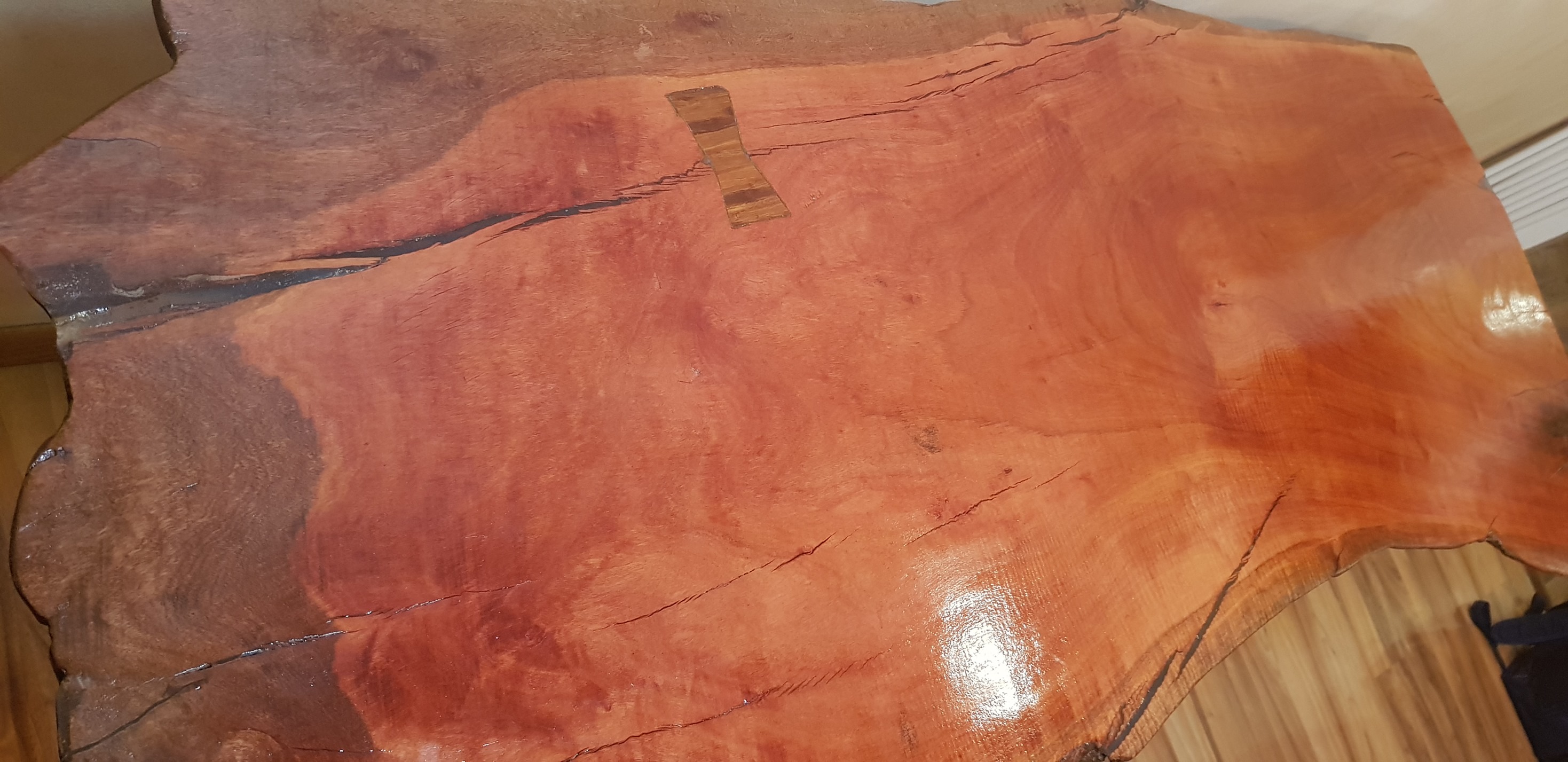 Live edge table with galvanised pipe base