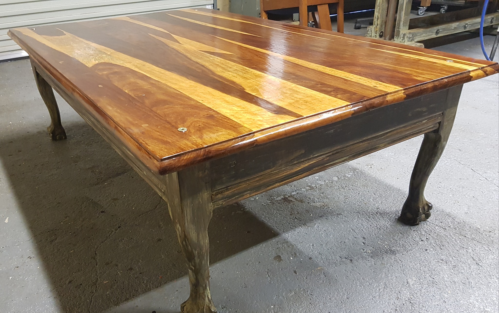 Custom built Kiaat coffee table with painted, solid wood base — Image 2