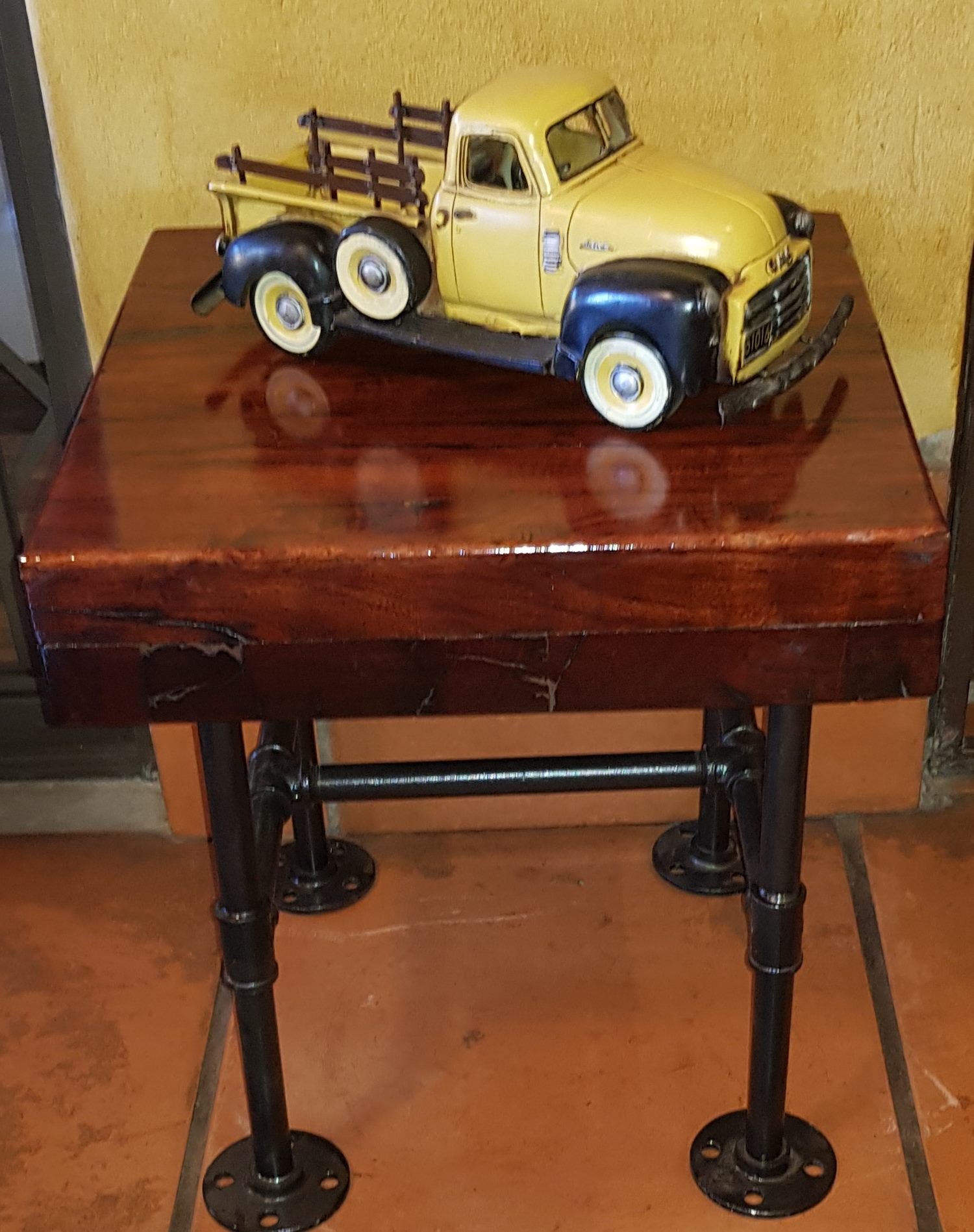 Solid 10cm thick sleeper side table with galvinised pipe legs