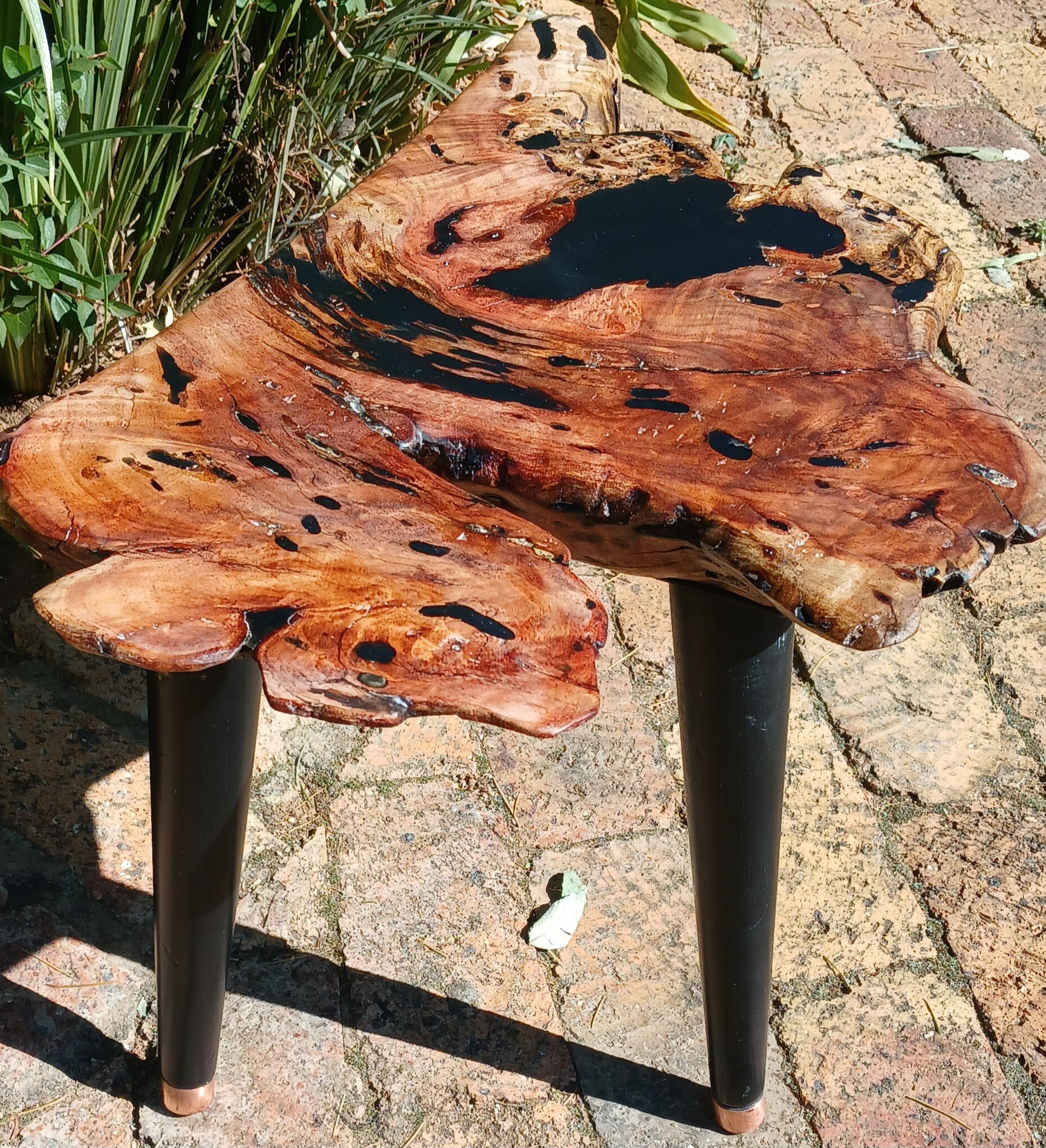 Small side table made out of black epoxy and a small offcut of a thorn tree i...