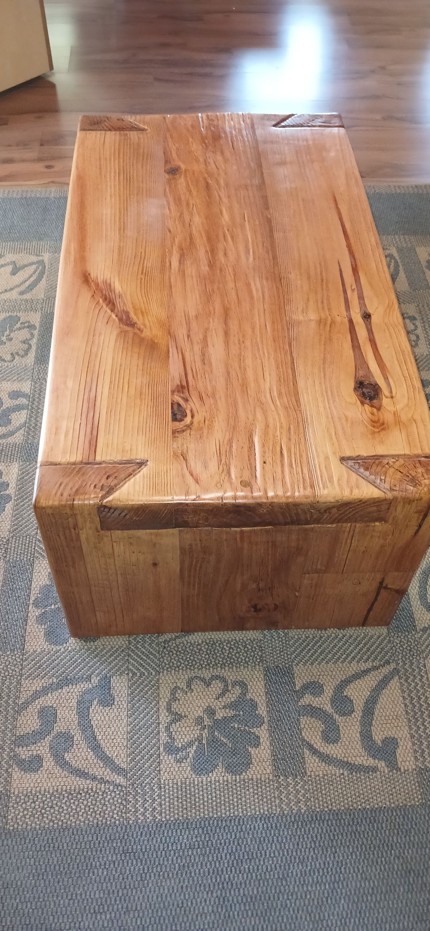 Coffee table with large dovetail joints, clad with beautiful kiaat underneath