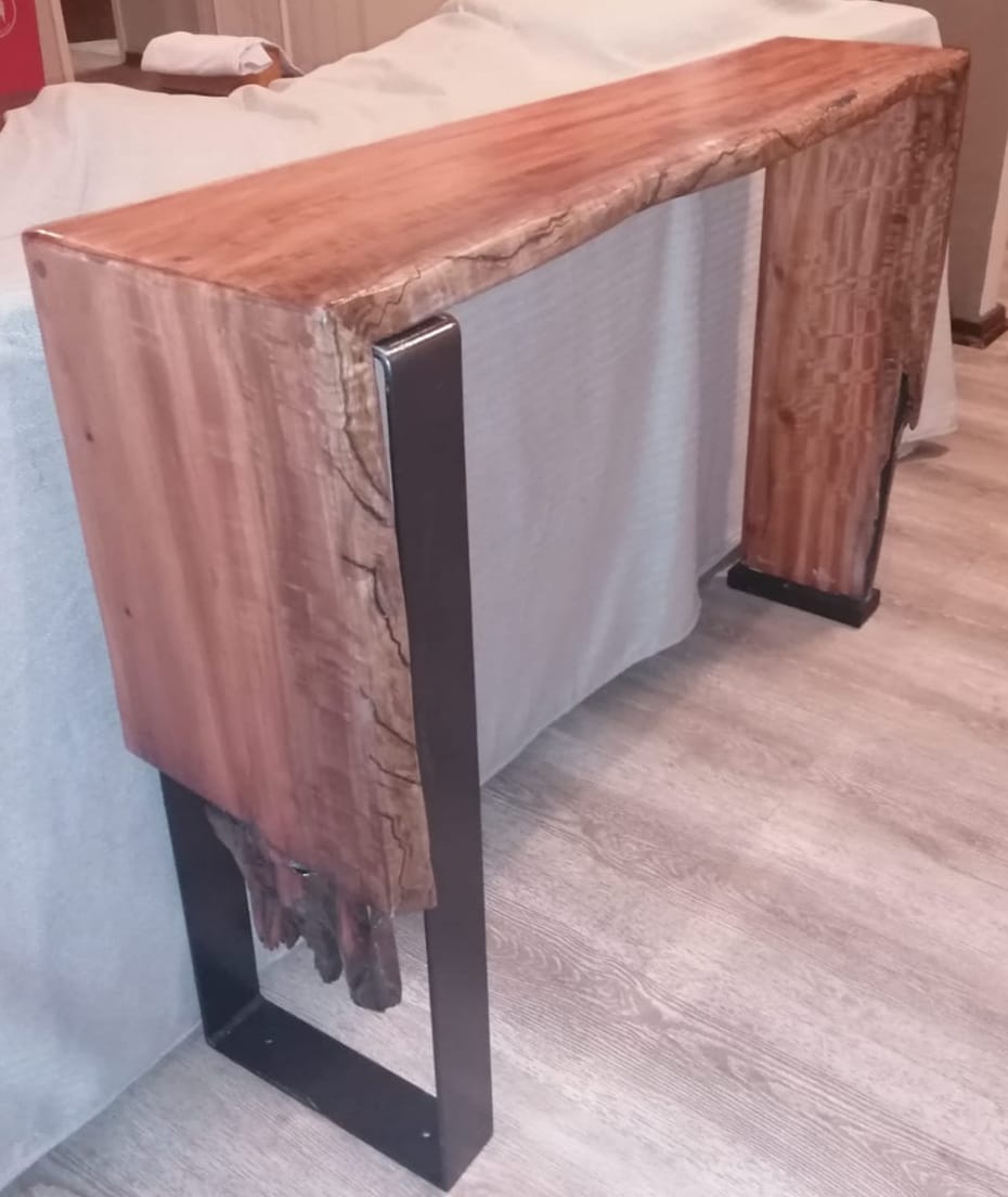 Waterfall console made from eucalyptus live edge slabs