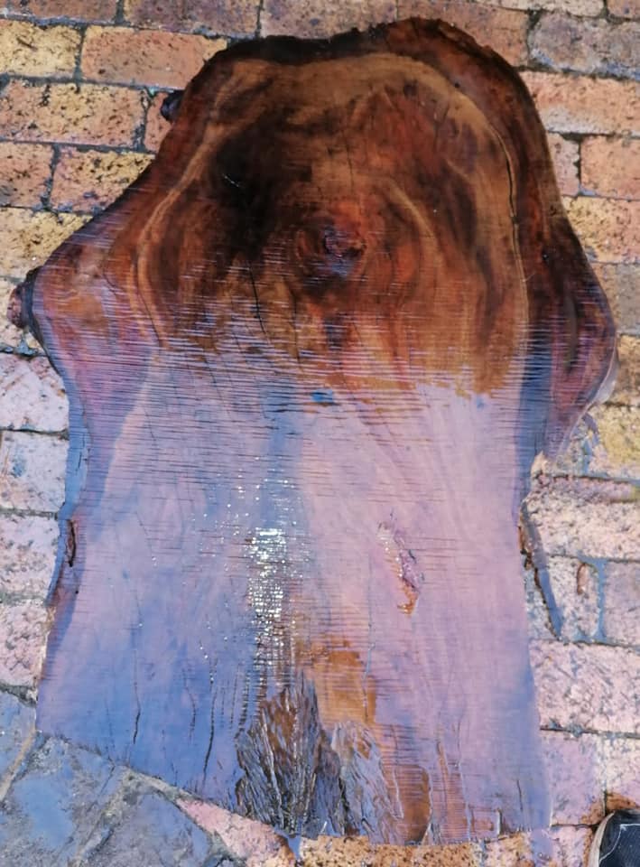 How the piece started as a reclaimed dirty slab and how we slowly brought out...