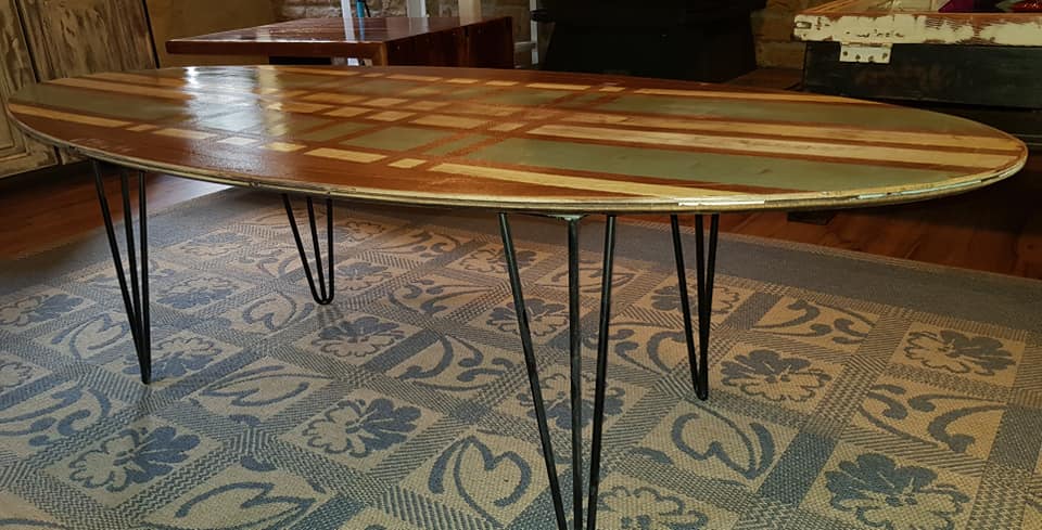 Reclaimed mid century modern coffee table with a bit of an African twist